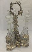 A plated and cut glass decanter set in the manner of Henry Elkington,
