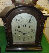 A circa 1900 oak cased mantel clock,