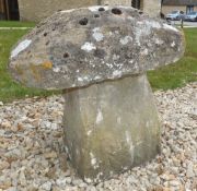 A squat stone staddle stone CONDITION REPORTS Approx 43cm high total.  Top approx 47cm wide.