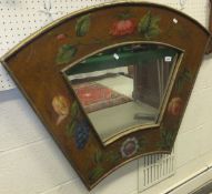A 20th Century painted framed fan shaped wall mirror with floral decoration