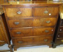 A Victorian mahogany chest of two short and three long graduated drawers on bracket feet