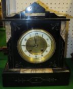 A slate cased mantel clock,