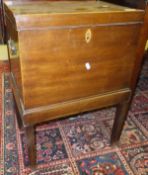 A 19th Century mahogany wine cooler, the rectangular top opening to reveal six section holder,