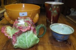 A Wedgwood lustre ware bowl decorated with dragons, a Carlton ware "Rouge Royale" pattern vase of