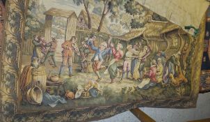 A tapestry style wall hanging depicting musicians in a village setting,