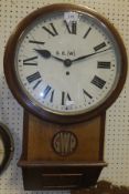 A drop dial wall clock, the white enamelled dial inscribed "B R (W)." and bearing Roman numerals,