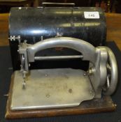 A small vintage Ideal sewing machine, Patent UK 30264,