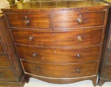 A Victorian mahogany bow fronted chest of two short and three long graduated drawers on splayed