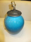 A box containing various sundry items to include a turquoise crackle ware lamp base,