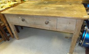 A Victorian pine kitchen table, the plain top above a single drawer,