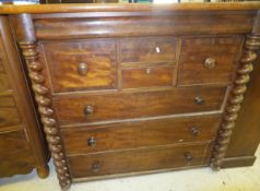 A Victorian mahogany Scotch chest, the cushion drawer over two small drawers,