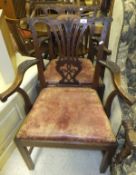 A pair of 19th Century mahogany carver chairs in the Chippendale style