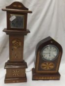 A mahogany and inlaid lancet cased mantel clock, the dial inscribed "Jaeger Paris 8 Jours",