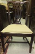 A composite set of Victorian mahogany dining chairs in the provincial Chippendale manner,