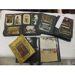 Two early 20th Century postcard albums containing assorted topographical postcards,