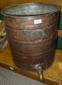 A copper barrel with brass tap, the barrel embossed "Flitoner Russell & Co.