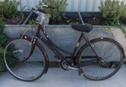 A mid 20th Century Raleigh ladies bicycle