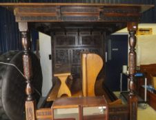 A modern carved oak full tester bedstead in the 16th Century manner CONDITION REPORTS General wear