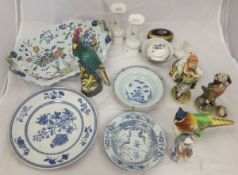 Two Chinese porcelain bowls, a pottery figure of a pheasant, an Oriental figure of a cockerel, a