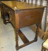An oak kneehole desk in the Old Charm manner,