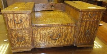 A Hungarian ash toilet mirror base with various cupboards and drawers