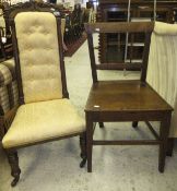 A Victorian rosewood framed prie a dieu chair with carved decoration and gold coloured upholstery