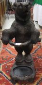 A resin figure of a bear, in the Black Forest manner, formed as a stick stand CONDITION REPORTS A