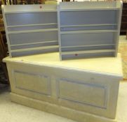A modern cream painted blanket box / trunk and a pair of cream display shelves