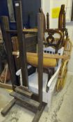 A collection of furniture comprising a studio easel, a Windsor & Newton folding easel, a Heal's cot,