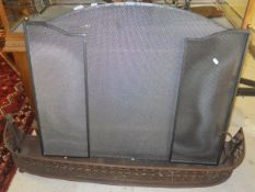 A painted iron three fold spark guard,