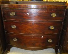 An early 19th Century mahogany bow fronted chest,