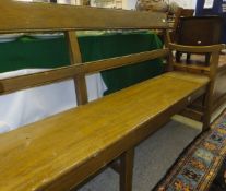 A painted wooden railway style bench