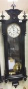 A 19th Century ebonised cased Vienna style regulator wall clock