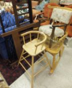 A modern ash stick back rocking chair with crinoline stretcher,