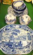 A 19th Century Staffordshire pottery meat plate, blue transfer decorated with figures in a garden