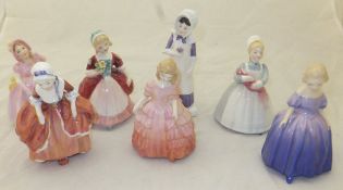 A collection of seven Royal Doulton figurines "Babie", model No. HN 2121, "Anna", model No. HN 2802,