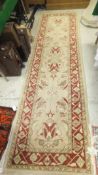 A Persian style runner,