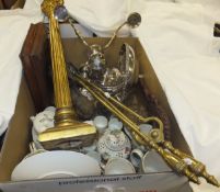 A box containing a set of three brass fire tools,