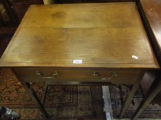 An oak rectangular side table, the single drawer above square tapering legs,