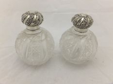 A pair of silver mounted cut glass grenade scent bottles (Chester,
