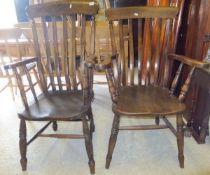 Two stained beech slat back Windsor armchairs in the Victorian manner