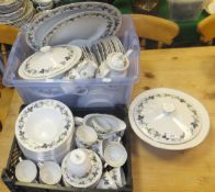 A large collection of Royal Doulton "Burgundy" pattern dinner and coffee wares to include two