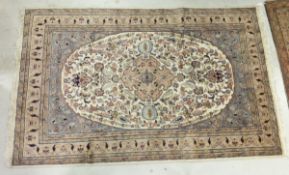 A Persian style rug,