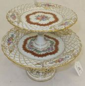 A Dresden porcelain two tier cake stand with pierced decoration CONDITION REPORTS Approx. 20 cm