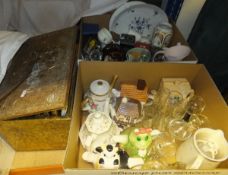 Two boxes of assorted china and glassware to include novelty teapots, Babycham glasses, vases, jugs,