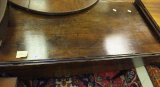 An early 19th Century mahogany drop-leaf Pembroke table with single end drawer on turned and ringed