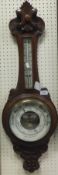A late Victorian walnut cased aneroid barometer / thermometer by J Siddall Optician Chester