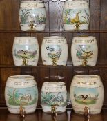 A collection of eight Victorian pottery spirit barrels,