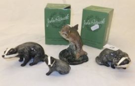 Three Beswick figures of badgers and another Beswick figure of a trout (1390)