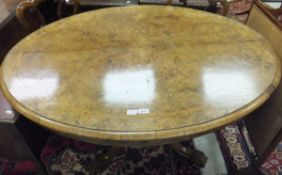 A late Victorian burr walnut and marquetry inlaid oval loo table,